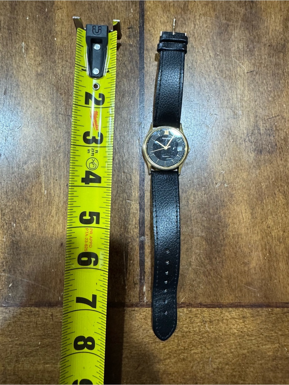 Men's Black Leather Strap Watch with Gold-Tone Case
